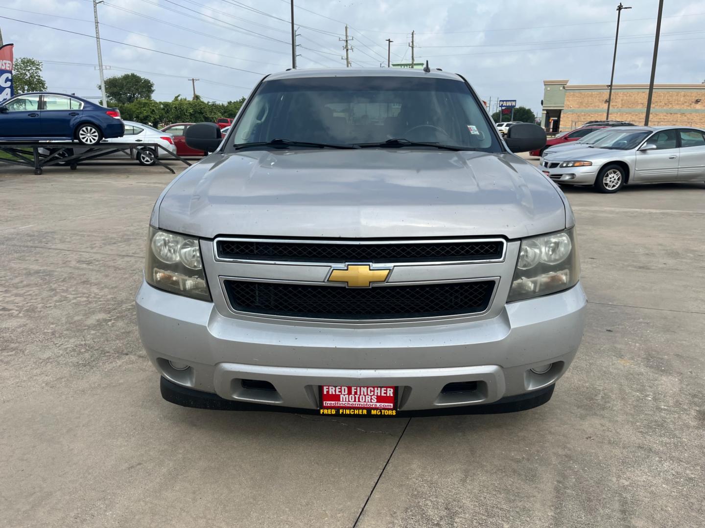 2009 SILVER /TAN Chevrolet Suburban LS 1500 2WD (1GNFC16069J) with an 5.3L V8 OHV 16V FFV engine, 4-Speed Automatic transmission, located at 14700 Tomball Parkway 249, Houston, TX, 77086, (281) 444-2200, 29.928619, -95.504074 - Photo#1